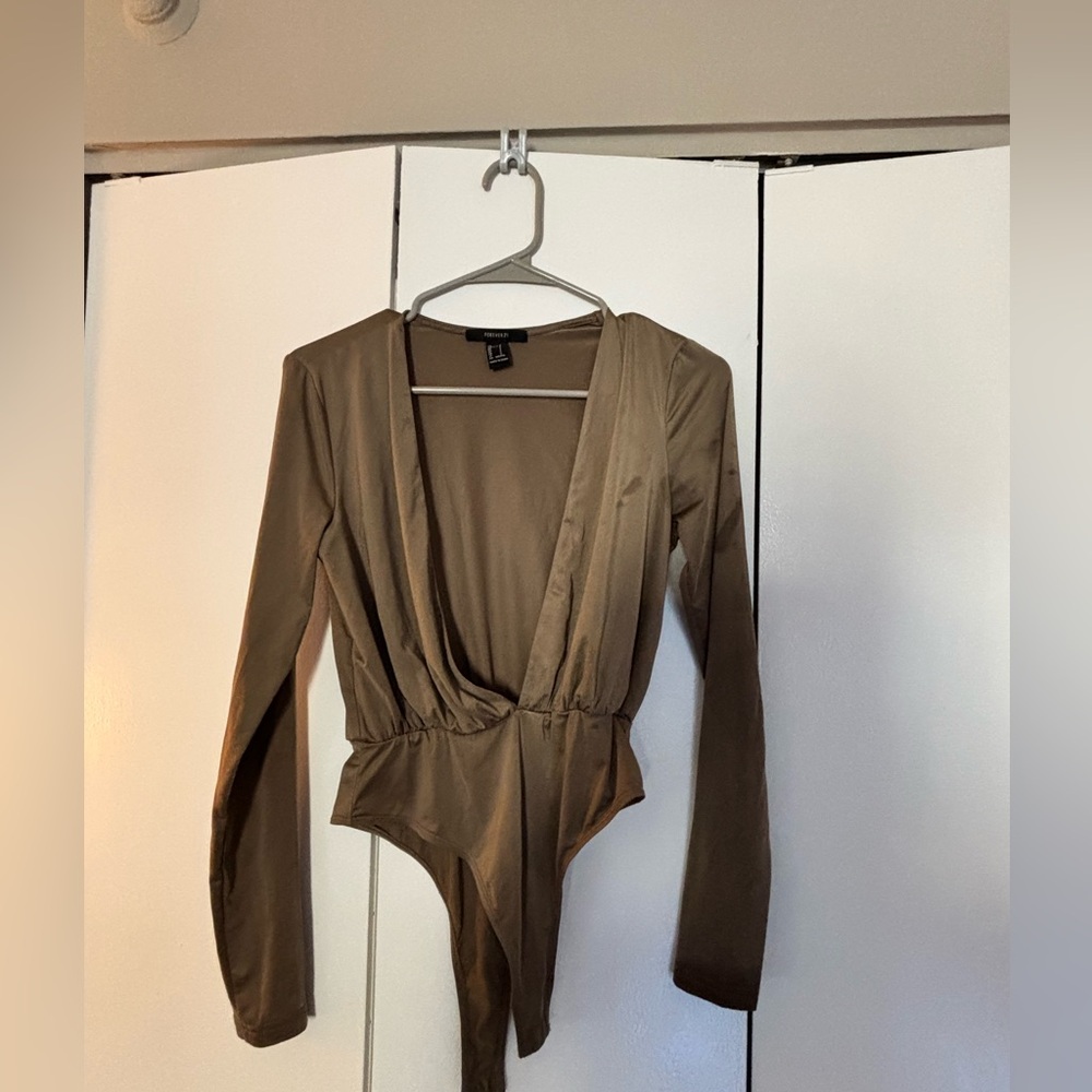 Forever 21 deep V neck long sleeve athletic sleeve body suit.